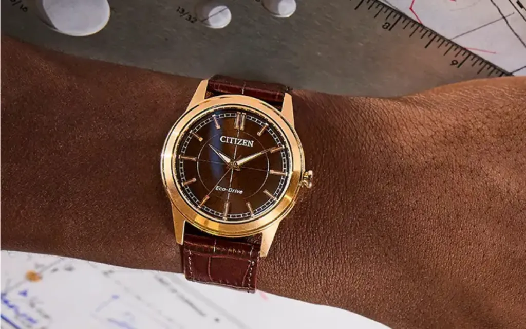 Citizen Rolan AW2113-16X front view showing rose gold case and brown metal dial