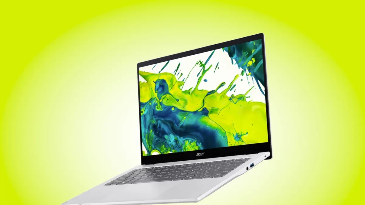 The Acer Swift Spin 14 convertible laptop shown in a professional office setting with an active stylus.