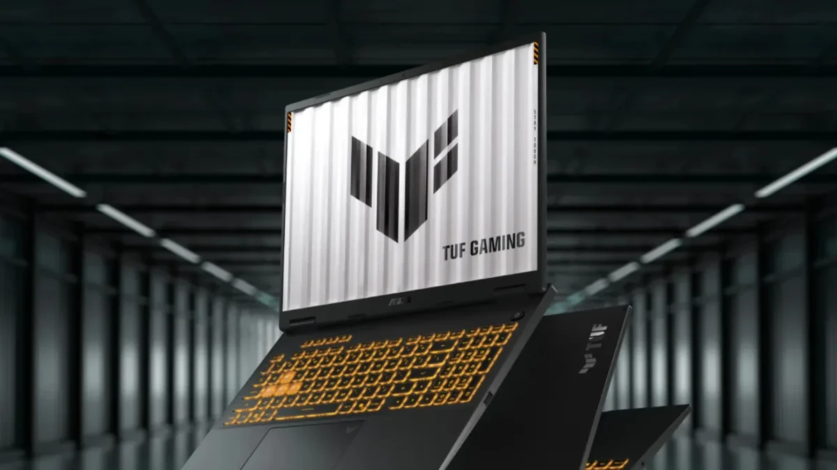 The Asus TUF Gaming 16 (2026) sitting on a desk with a glowing keyboard
