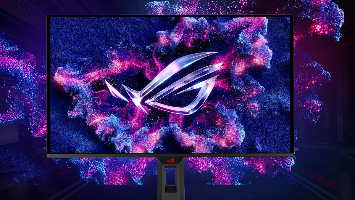 The Asus ROG Strix OLED XG27ACDMSR gaming monitor viewed from the front showing a vibrant in-game scene.