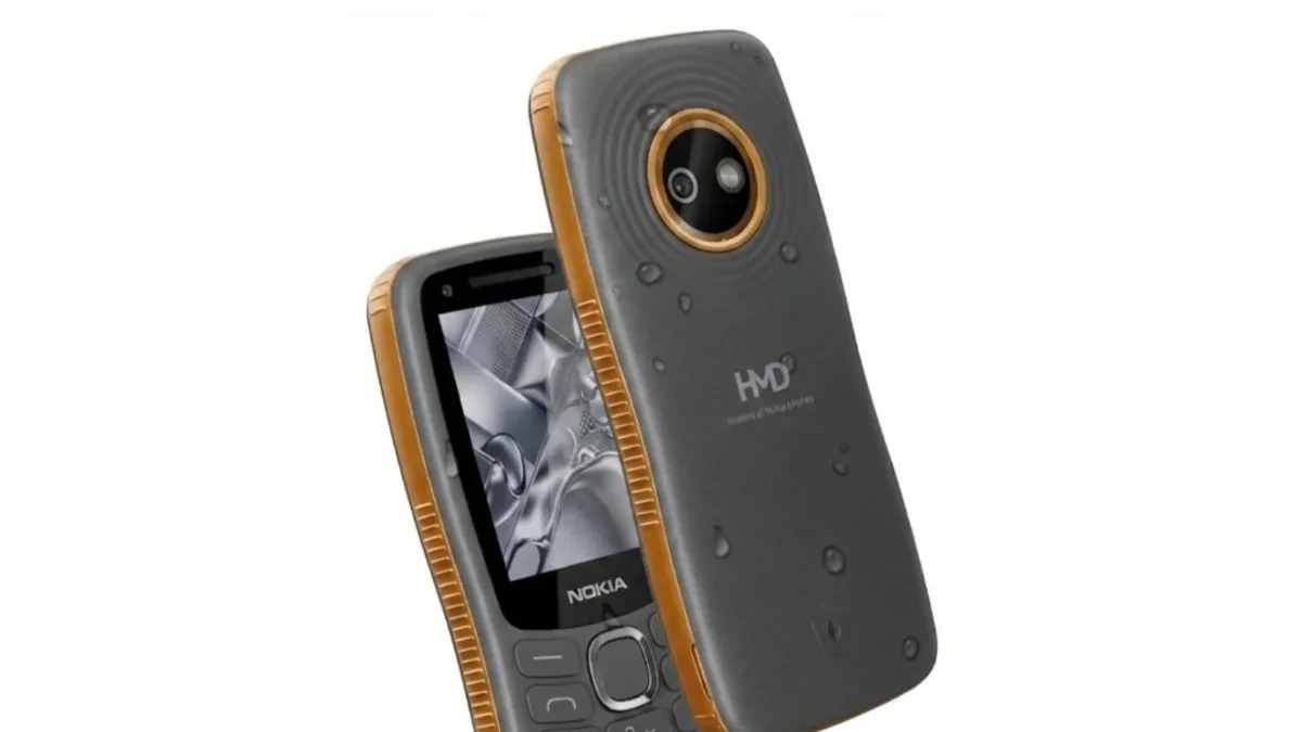 A close-up view of a new, rugged HMD feature phone featuring a grey shell, copper accents, and a front-facing camera lens.