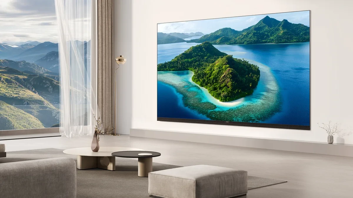 A modern large-screen television displaying vibrant colors in a home setting