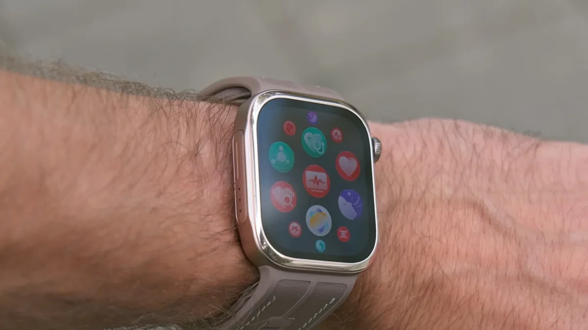 Huawei Watch D3 showing blood pressure tracking interface on a wrist