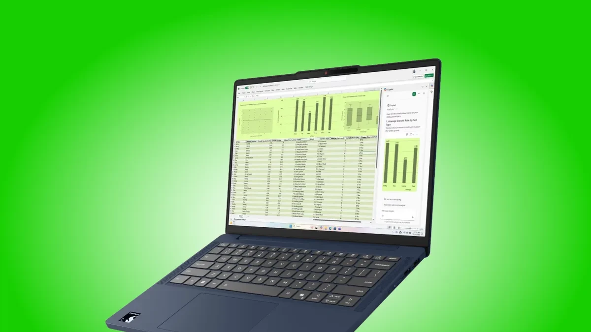 Lenovo IdeaPad Slim 3 14-inch laptop shown from the side in a clean office setup