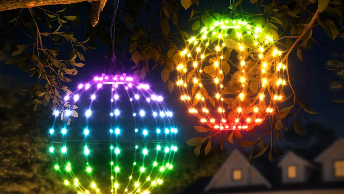 Govee Ball Lights hanging outdoors in a backyard garden at dusk