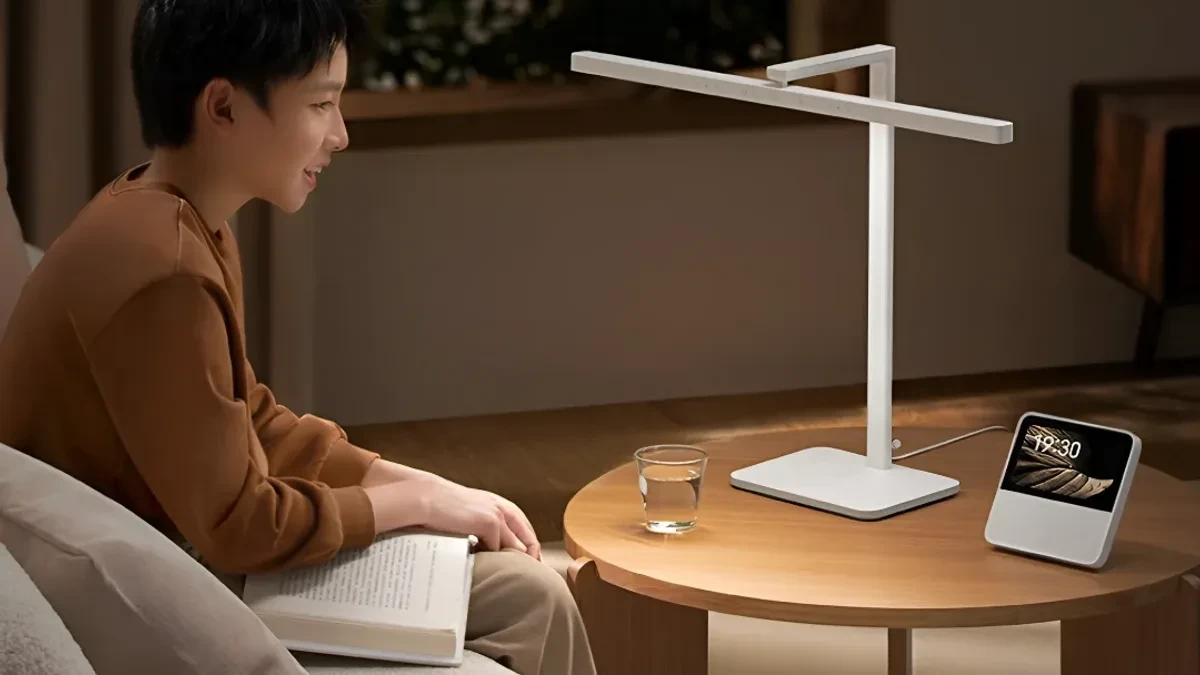 Xiaomi Mijia Desk Lamp 2 Clear Vision Edition on a modern workspace desk illuminating a keyboard and laptop setup