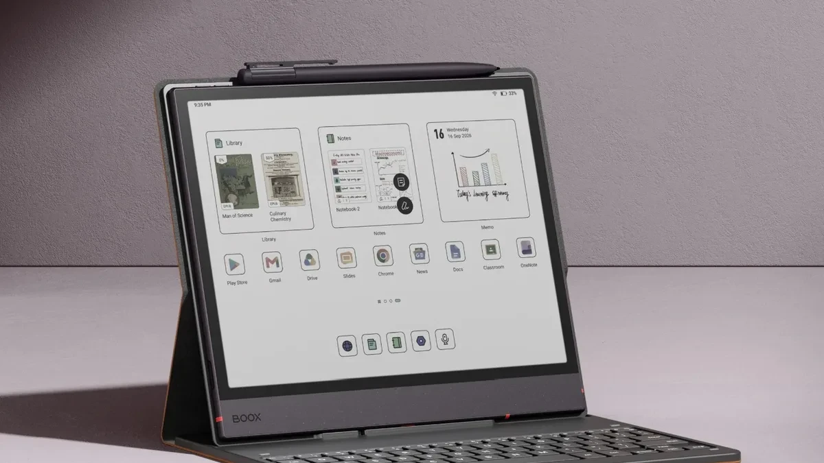 The Boox Note Air6 C tablet displaying a document on its color E Ink screen next to the magnetic stylus.