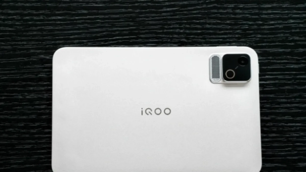 The iQOO Pad Ultra gaming tablet showing its slim profile and side-mounted cooling vents.