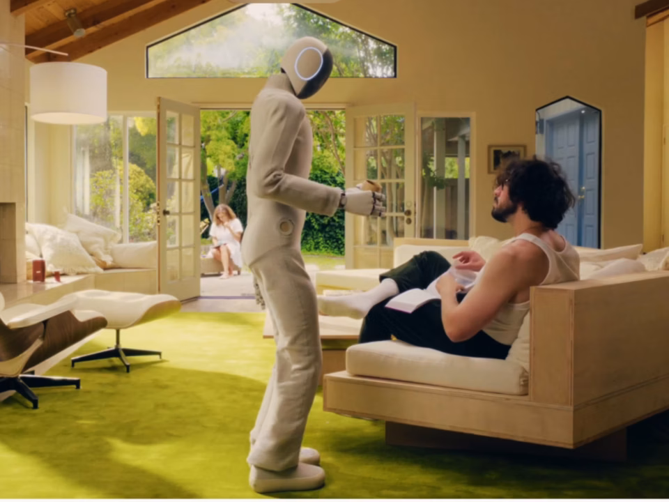 1X NEO household robot assisting with home chores and tasks