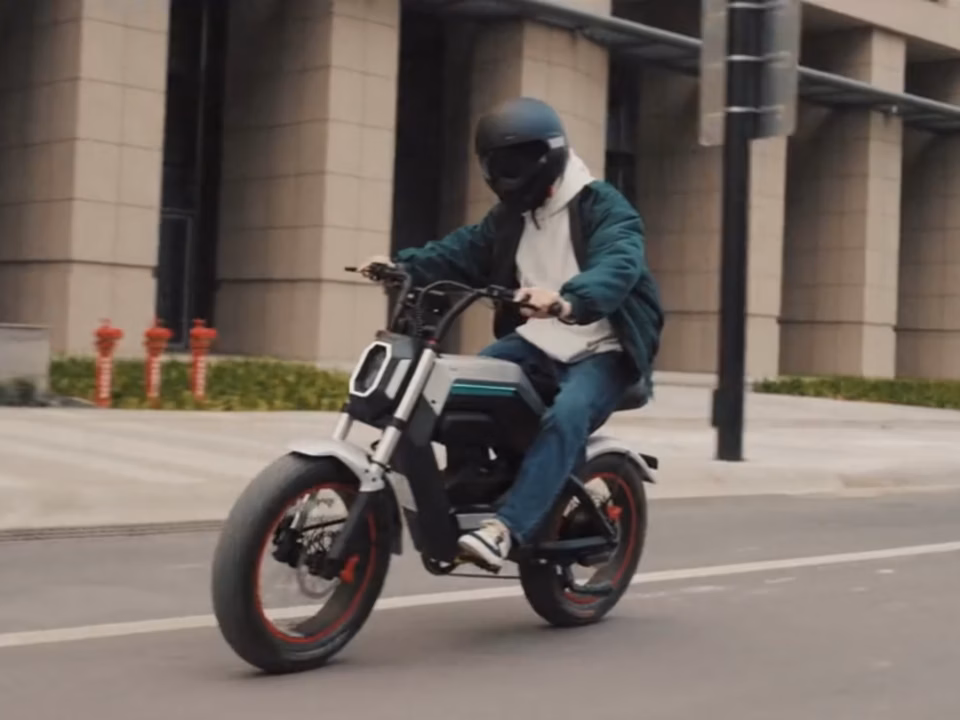 Aotos Flux X26 hybrid e-bike featuring motorcycle design and electric bike technology
