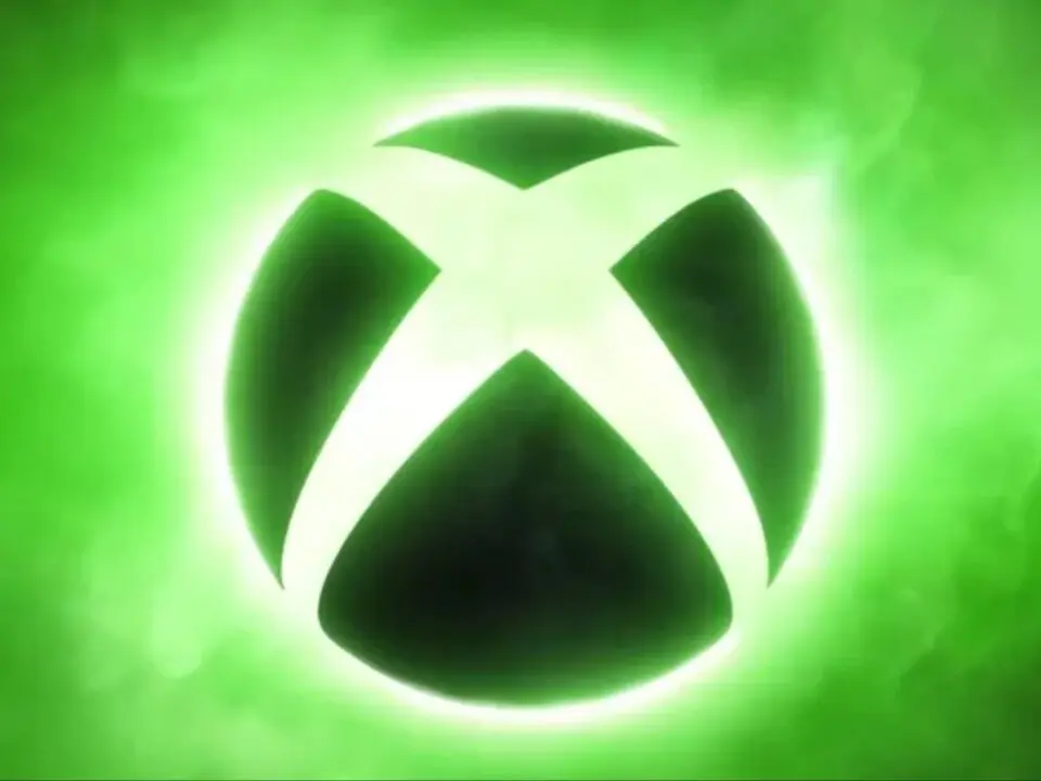 Glowing green original Xbox logo symbolizing Microsoft's gaming division