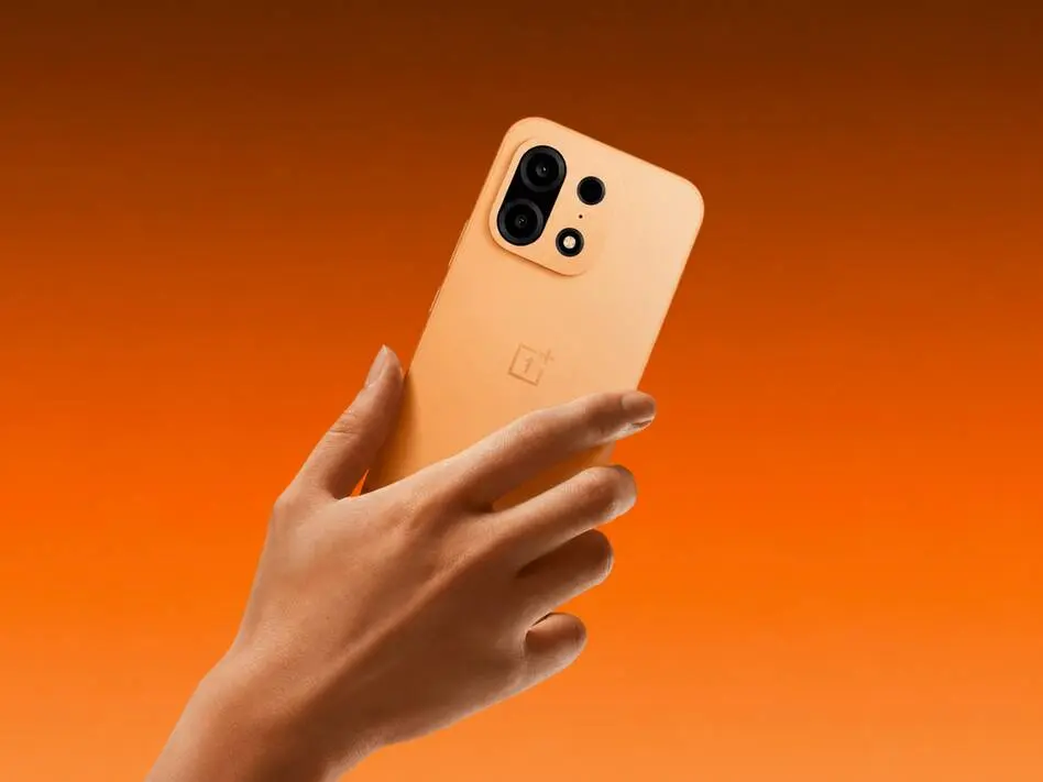 OnePlus Turbo 6X Pro Charges Battery Life With 8000mAh Power And Bold Colors OnePlus Turbo 6X Pro smartphone in orange finish showcasing rear camera design