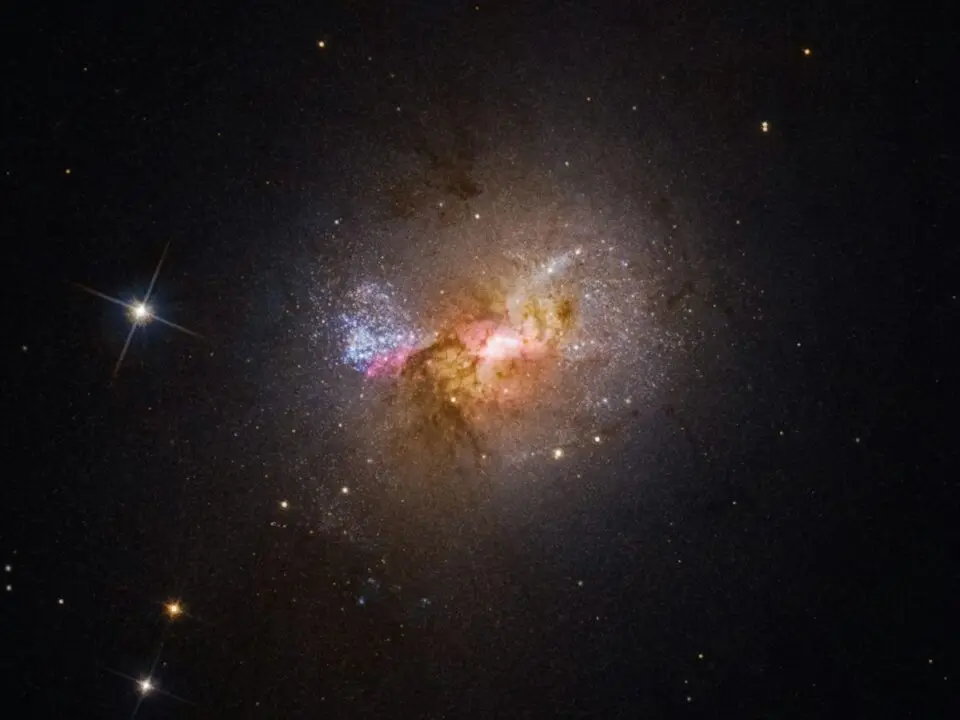 Large Magellanic Cloud Distorts Its Small Companion Galaxy’s Structure The Large Magellanic Cloud distorting its companion galaxy observed through infrared astronomy